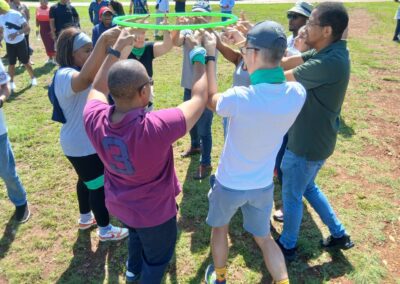 Amazing Race with Team Events, the Hula Hoop Down Contest.